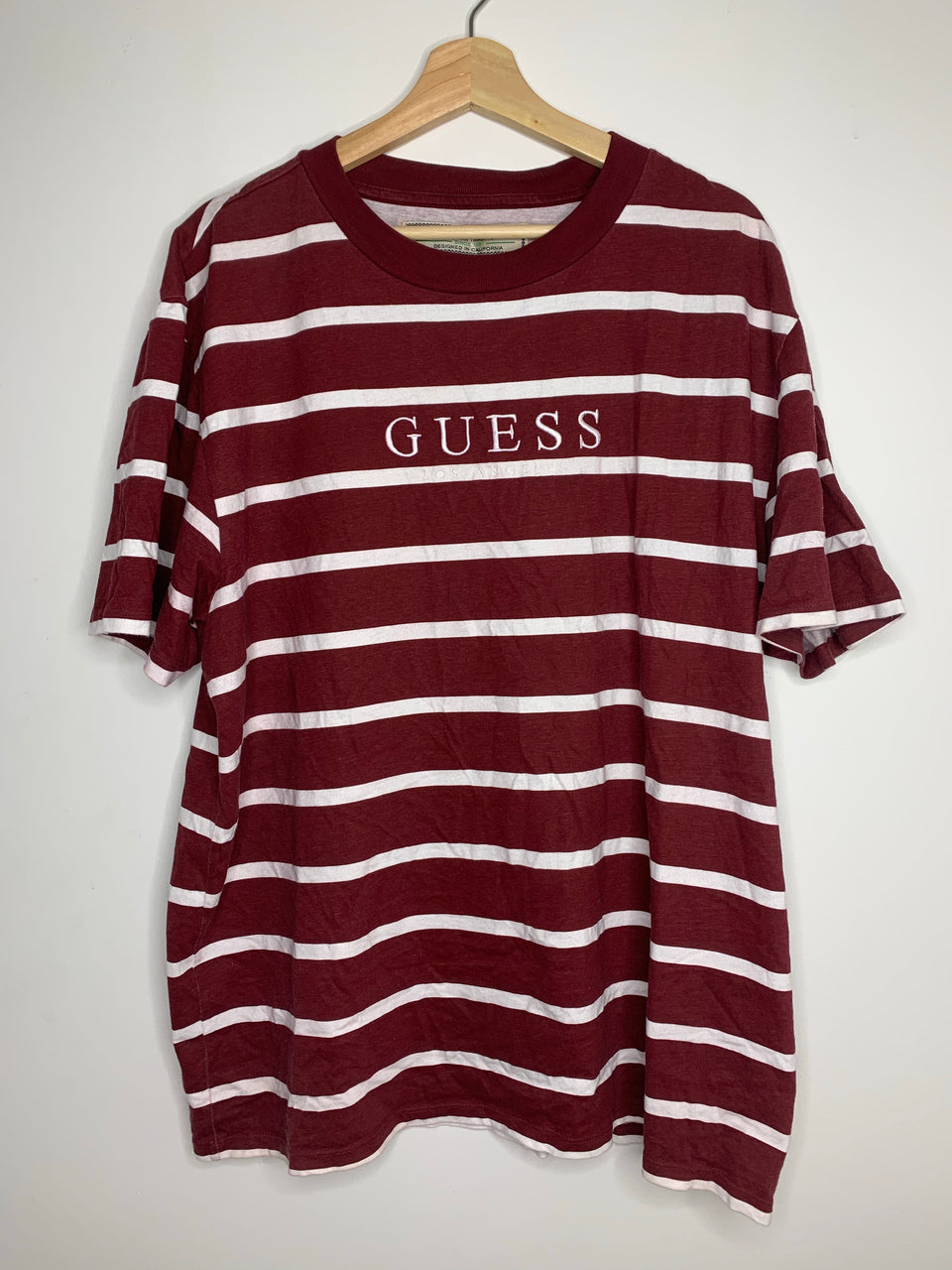 red and white striped guess shirt