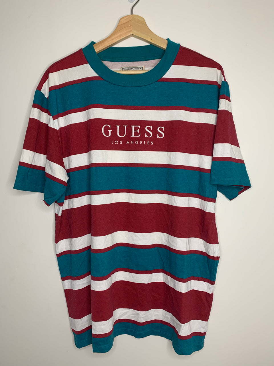 red white and blue guess shirt