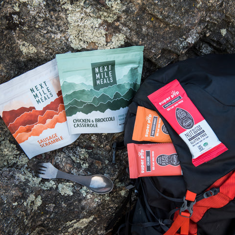 keto backpacking food and protein bars in a backpack