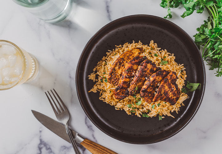 grilled ancho chile chicken breast cutlets over rice