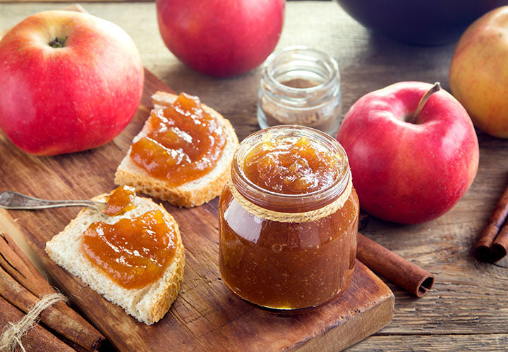Apple butter recipes spiced with cinnamon and served on toasted bread.