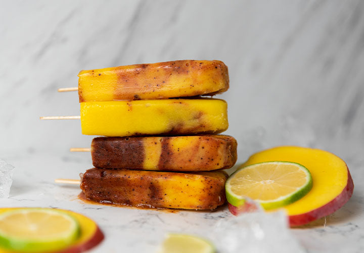 Frozen treats made with mango, lime juice, and chile pepper
