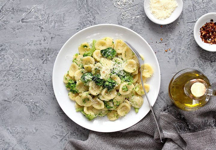 Pasta dish made with sausage, broccoli, and cheese.