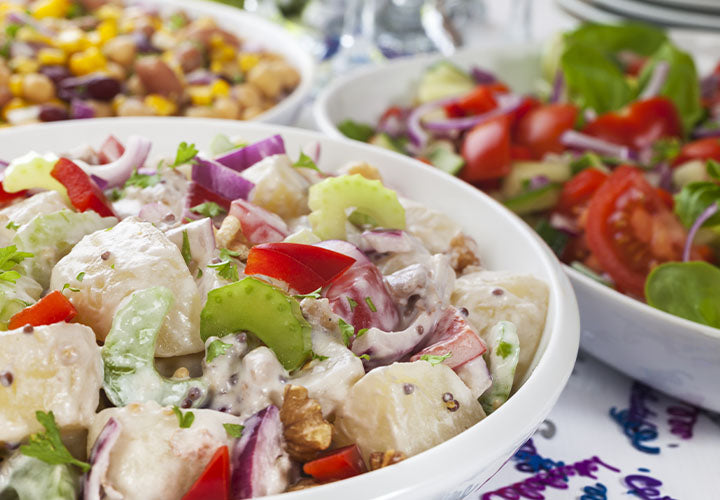 Potato salad with ranch dressing, bell pepper, and celery.