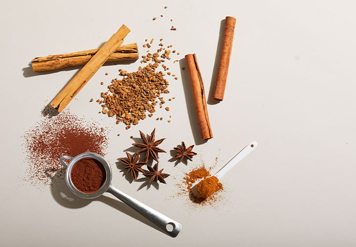 Baking spices like cocoa powder and cinnamon for chili recipes.