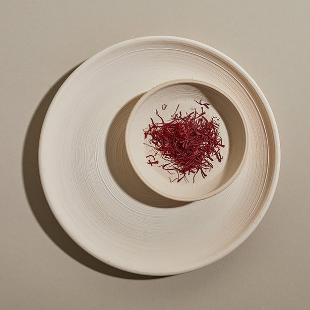 Saffron spice in white bowl