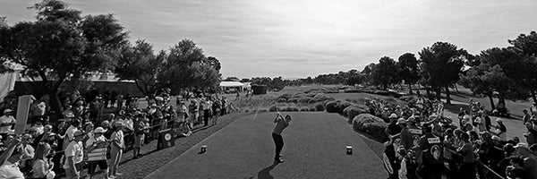 golfer teeing off at a qualifying tournament