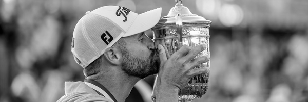 Brian Harman kissing the Open Championship trophy