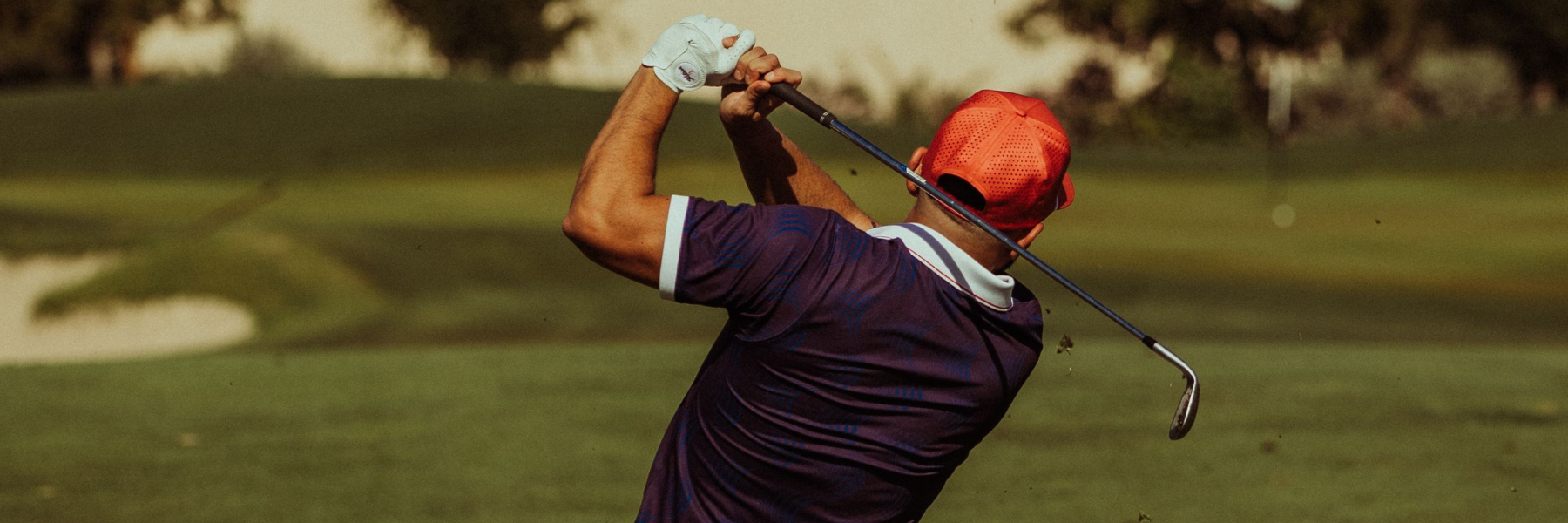 Devereux golfer swinging a club