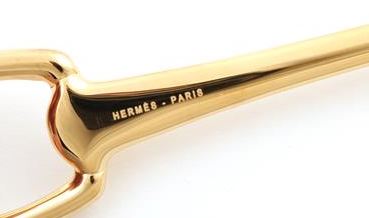 hermes spoon gold