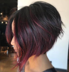 Dark hair balayage with magenta streaks