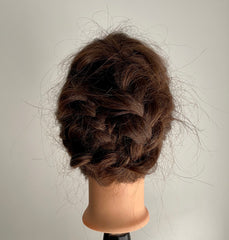 Braided updo on mannequin head