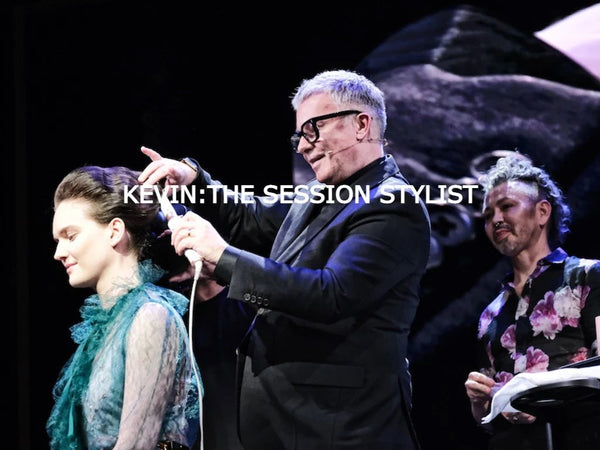 Kevin Murphy stylist on stage with model