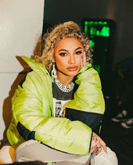 DaniLeigh with blonde curly hair