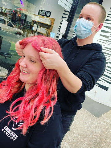 pink hair stylist