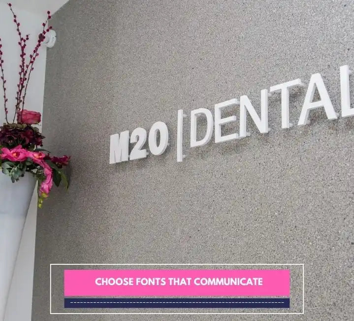 M20 Dental wall logo with flowers beside it and text ‘Choose Fonts That Communicate’.