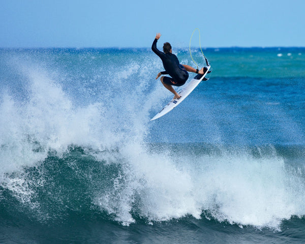 Entourage athlete Nathan Florence enjoys the Cali waves on his board