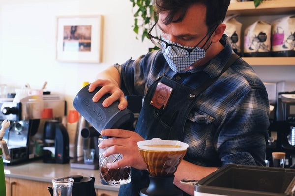 Sam Schroeder practicing at the Olympia Coffee Training Lab