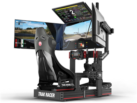 Trak Racer racing cockpit with quad monitor stand, wheel, pedals and shifter