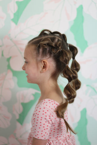 bubble braid hairstyle girl in ollie jay twirl dress 
