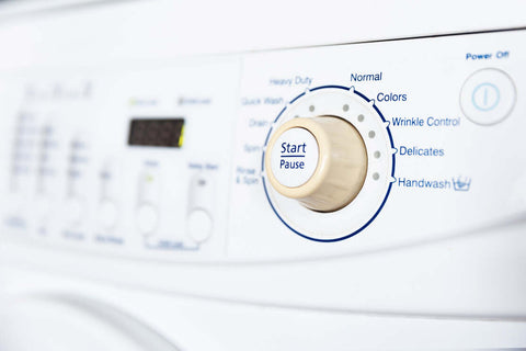 Laundry machine buttons