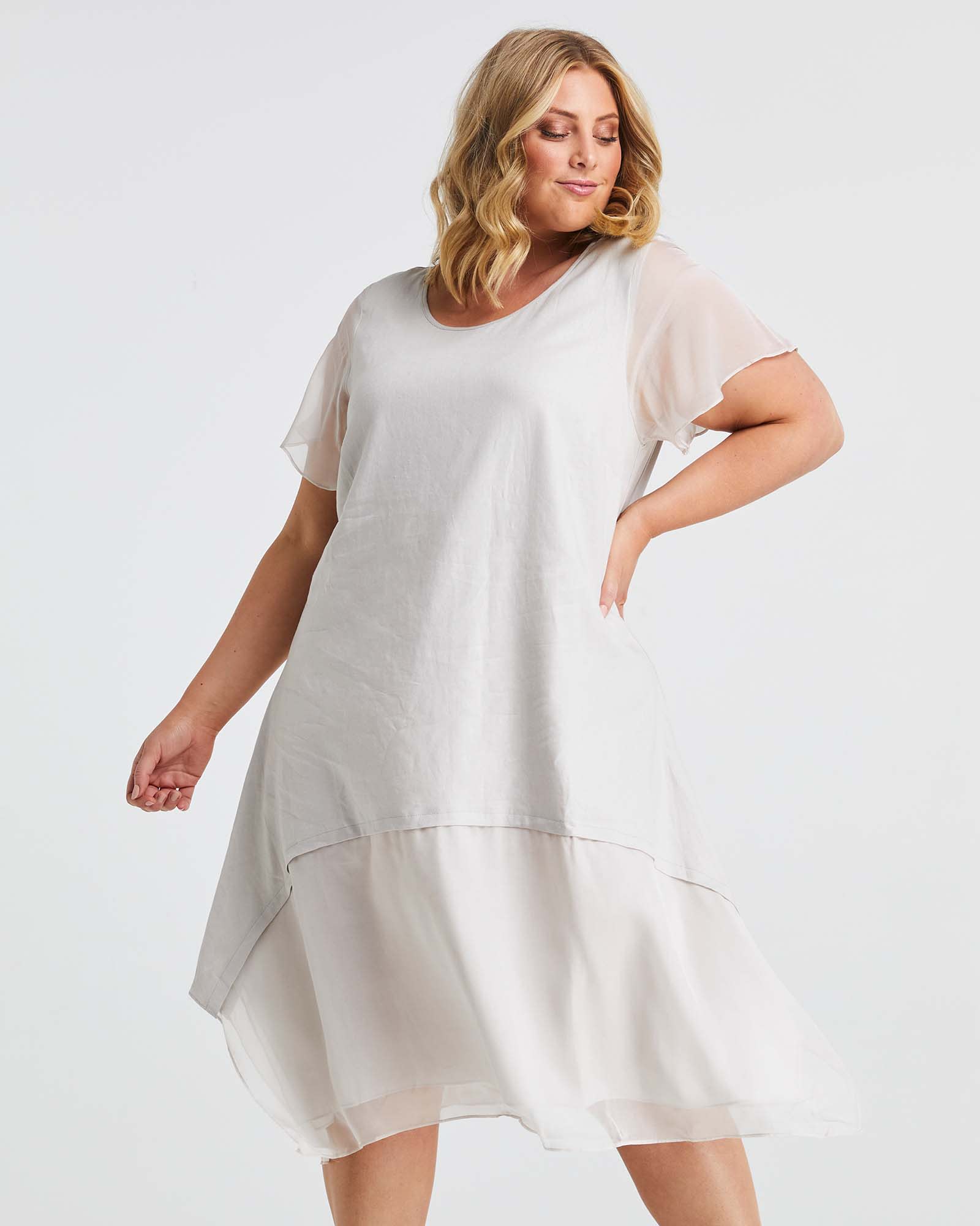 Plus size dress shop with sheer overlay