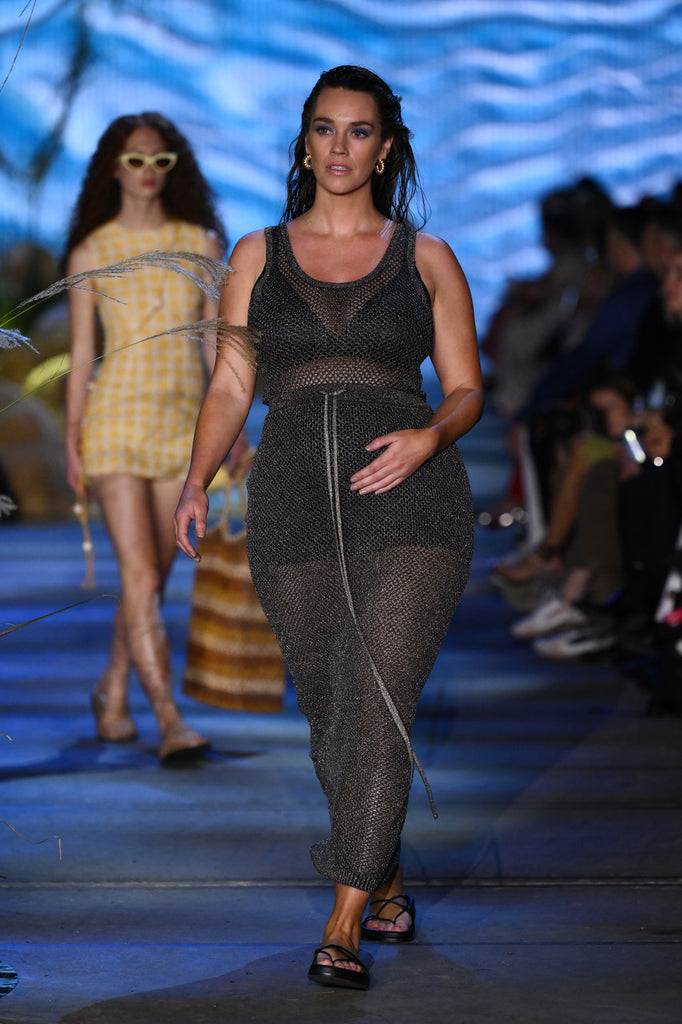 SYDNEY, AUSTRALIA - MAY 19: A model walks the runway during the We Wear Australian x Afterpay - Runway show during Afterpay Australian Fashion Week 2023 at Carriageworks on May 19, 2023 in Sydney, Australia. (Photo by James Gourley/Getty Images for AAFW)