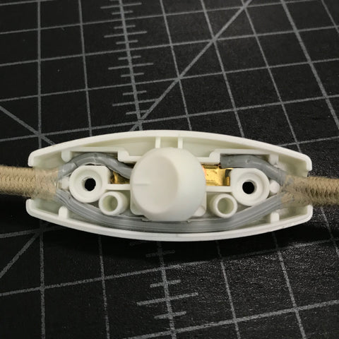 prepared parallel cord pressed into slim switch cover