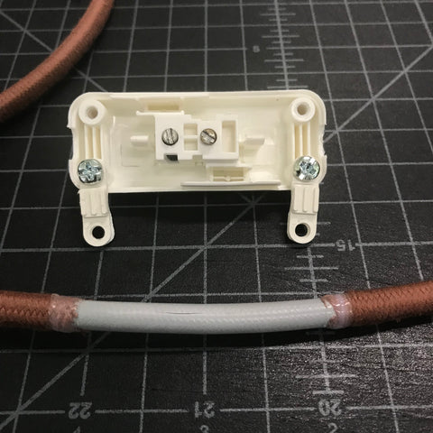 open vintage slim switch and pulley cord with fabric removed and ends taped