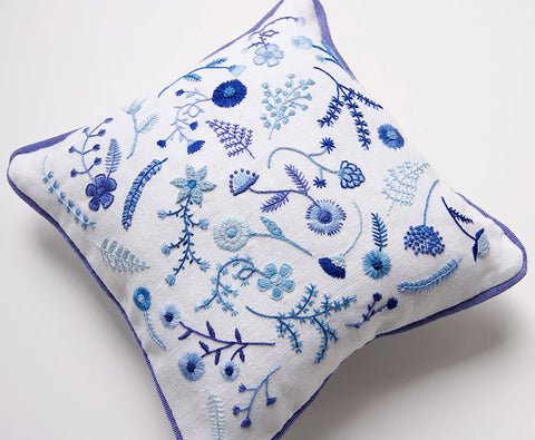 https://www.happycactusdesigns.com/products/hand-embroidered-blue-flowers-pillow