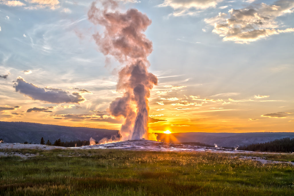 Old Faithful geyser erupting in Yellowstone.