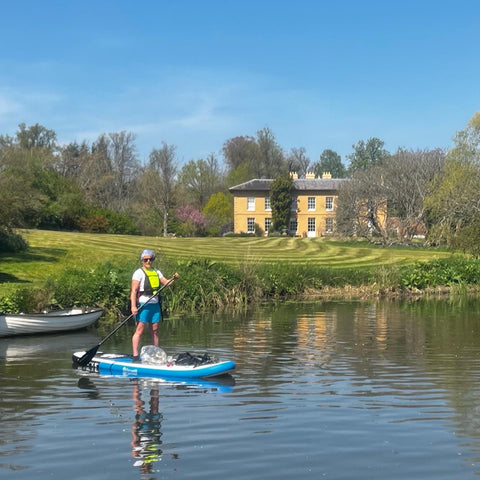 paddle boarding on river 