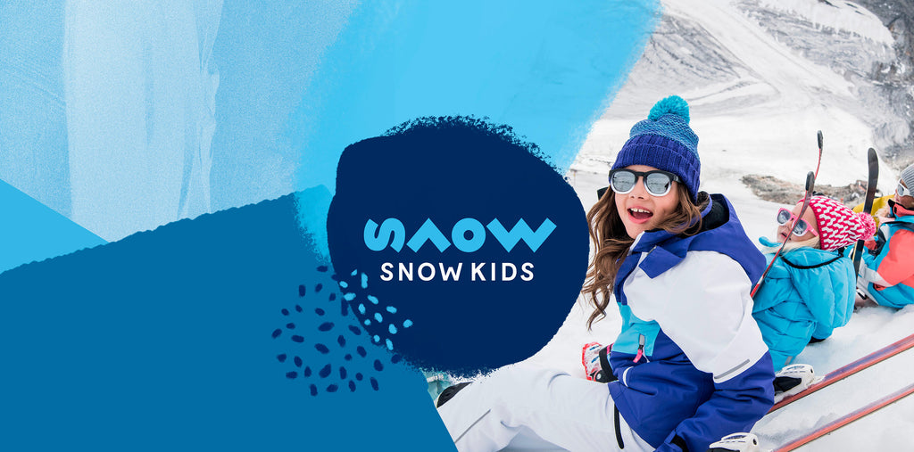 snowkids main logo banner with kids in snow gear and skis smiling and looking happy