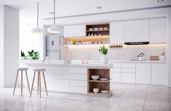 a clean well lit kitchen using various lighting to create a dynamic space