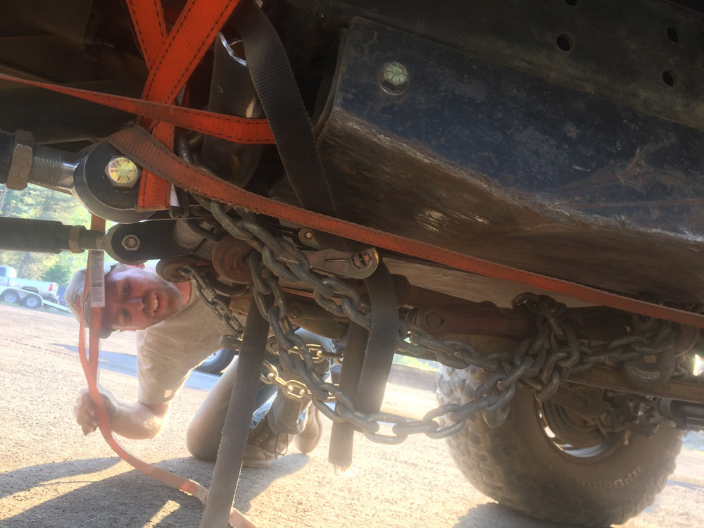 trail fix with rachet straps and chains on broken jeep crossmember