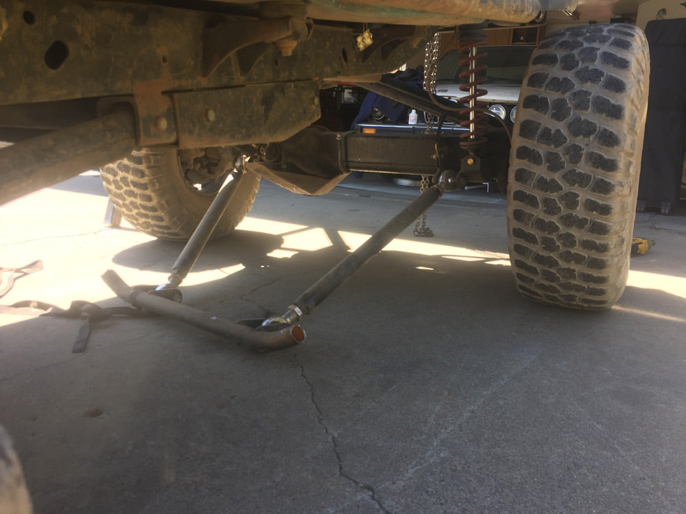 broken jeep wrangler crossmember rock and road metal fabrication