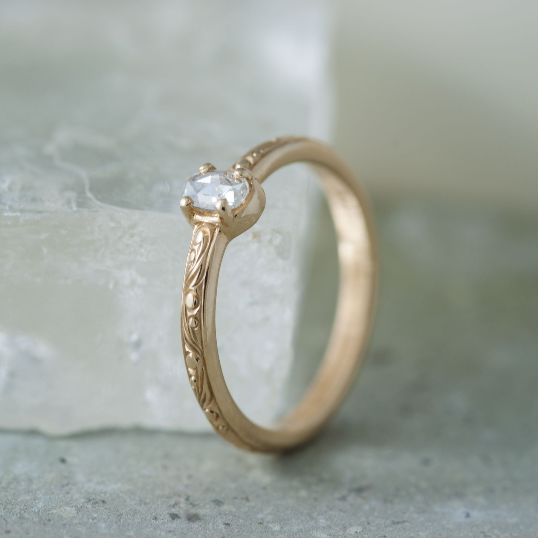 Unique hand engraved diamond engagement ring in yellow gold