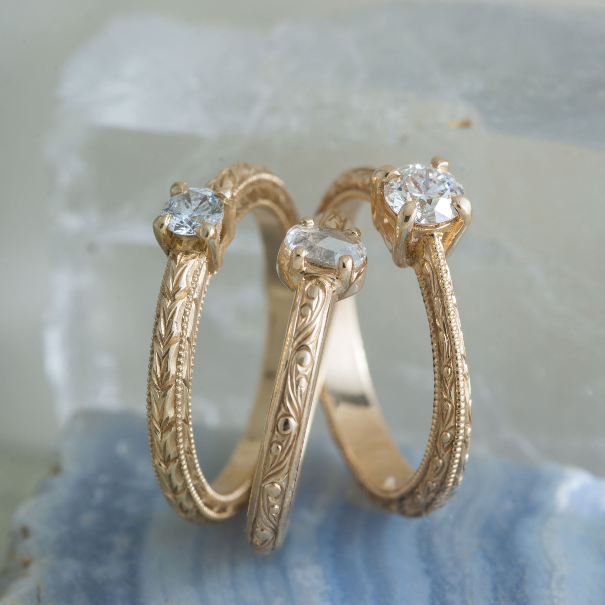 unique hand engraved engagement rings in yellow gold 