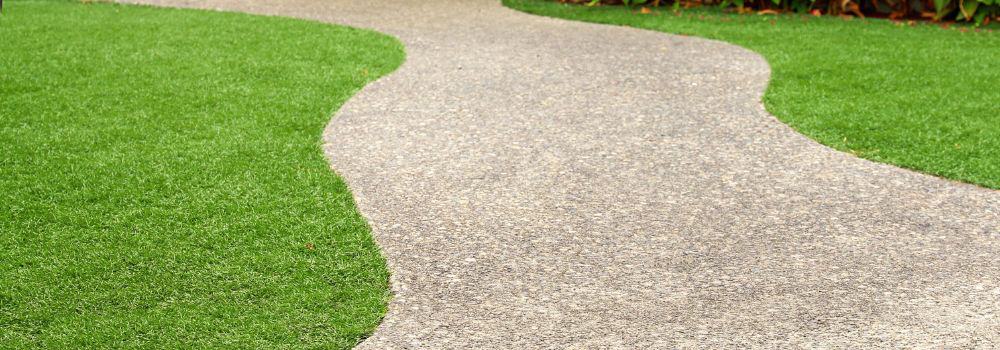 Artificial grass lawn with bordered path