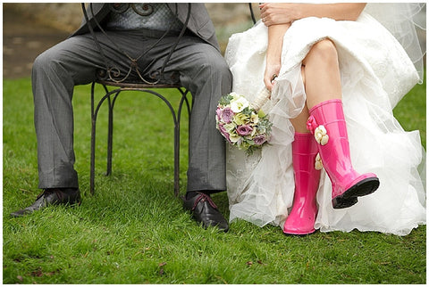 Bride with pink Wellington boots
