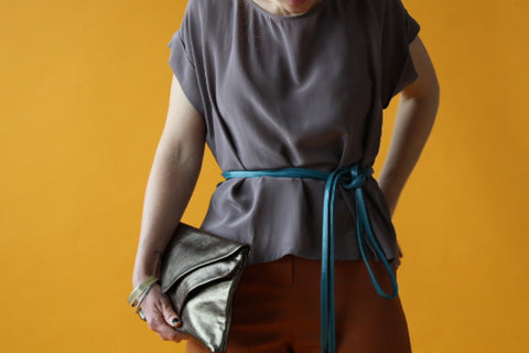 recycled leather clutch and skinny wrap belt