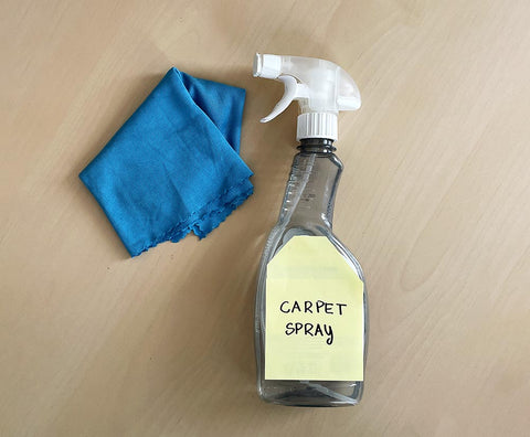 Use carpet spray to remove the stubborn stains