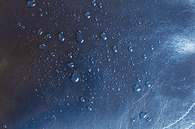 Water droplets on coated canvas