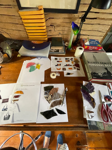 leather swatches on a desk for a fashion designer