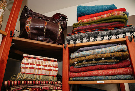 Crystalyn Kae studio filled with fabrics to upcycle