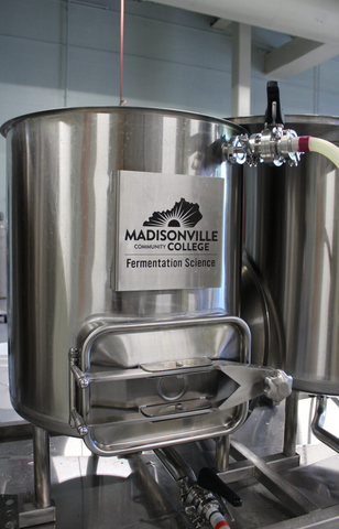 Homebrew system with a Madisonville Community College Fermentation Science label
