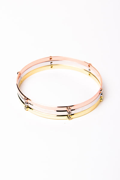 00 a simple and chic bangle available in three metallic tones