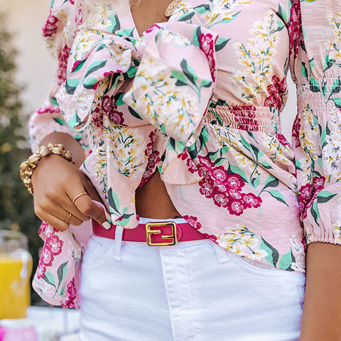 You will be one trendy girl when you complete your look with this dainty rose colored belt featuring a skinny faux leather and and a gold rectangular buckle!
