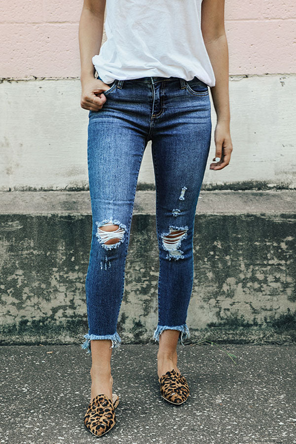 The Chloe Mid Rise Distressed Ankle Skinny