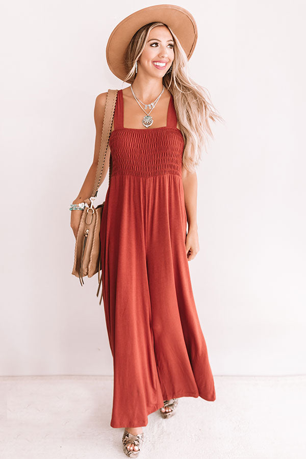 rust colored jumpsuit